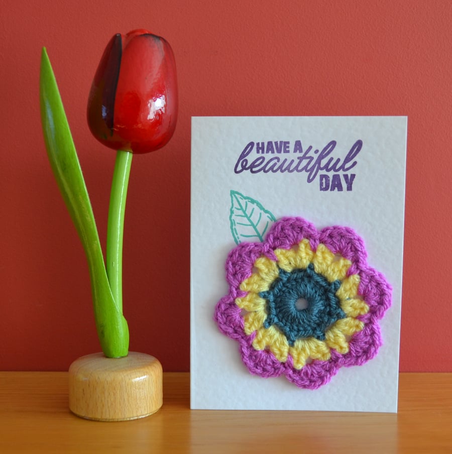 Greeting card with purple & yellow crochet flower - No. 07