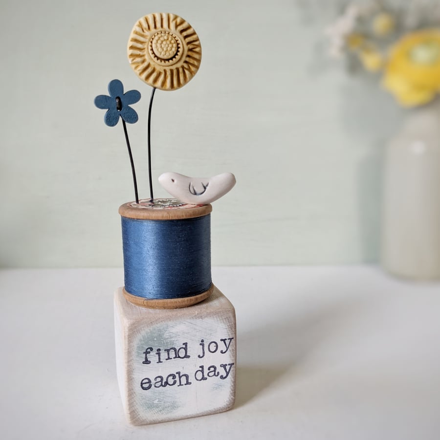 Clay Flower and Bird on a Vintage Bobbin 'find joy'