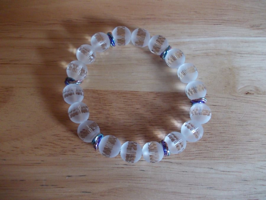 Frosted and faceted clear quartz elasticated bracelet
