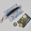 Key ring coin purse in lilac floral oilcloth 