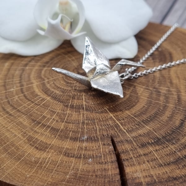 Real Origami crane preserved in silver, pendant necklace