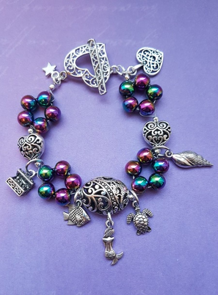 Mermaid charm bracelet with Rainbow Haematite beads.