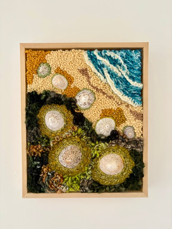 Hand embroidered artwork incorporating seashells - beach strandline