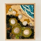 Hand embroidered artwork incorporating seashells - beach strandline