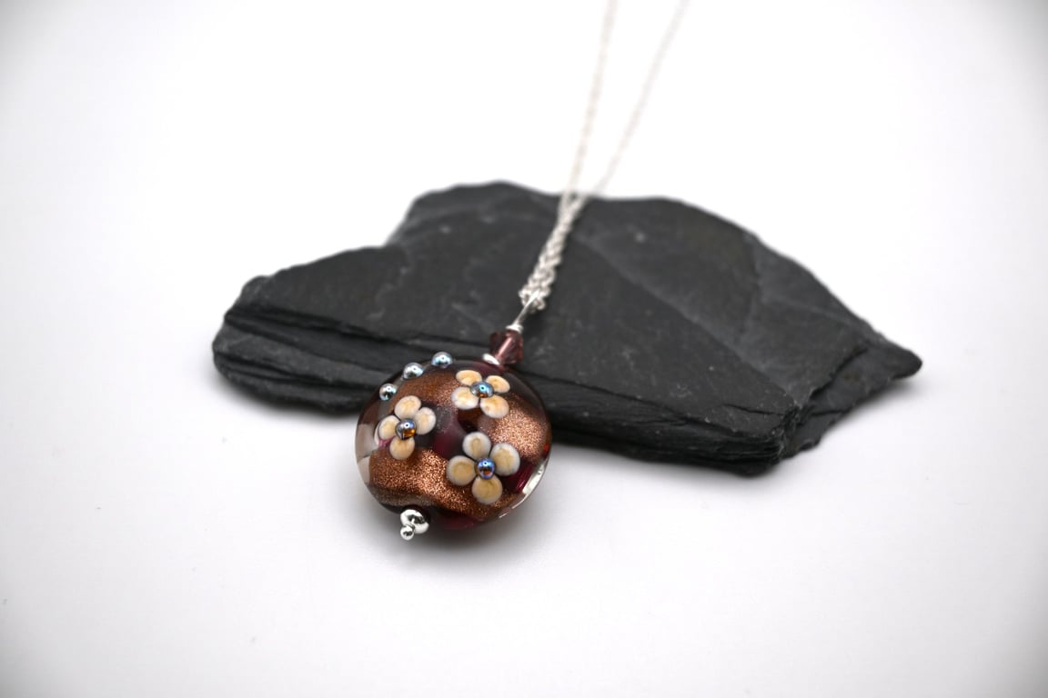 lampwork glass cranberry and goldstone flower pendant necklace
