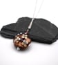 lampwork glass cranberry and goldstone flower pendant necklace