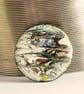 medium round brooch - scrolled red, yellow, black, blue on white - Image 3