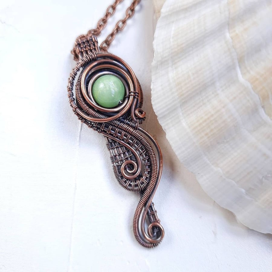 Copper pendant with an onyx bead