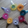 A trio of pretty organza hair clips