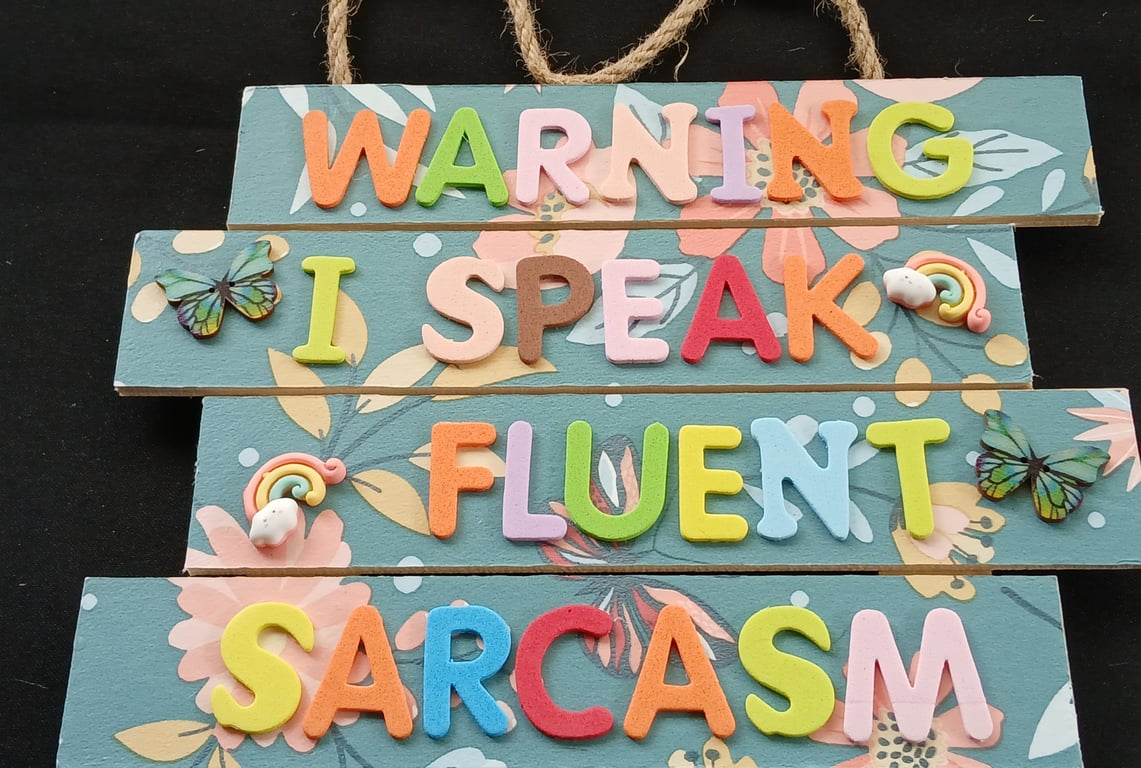 Hand decorated hanging wooden sign 