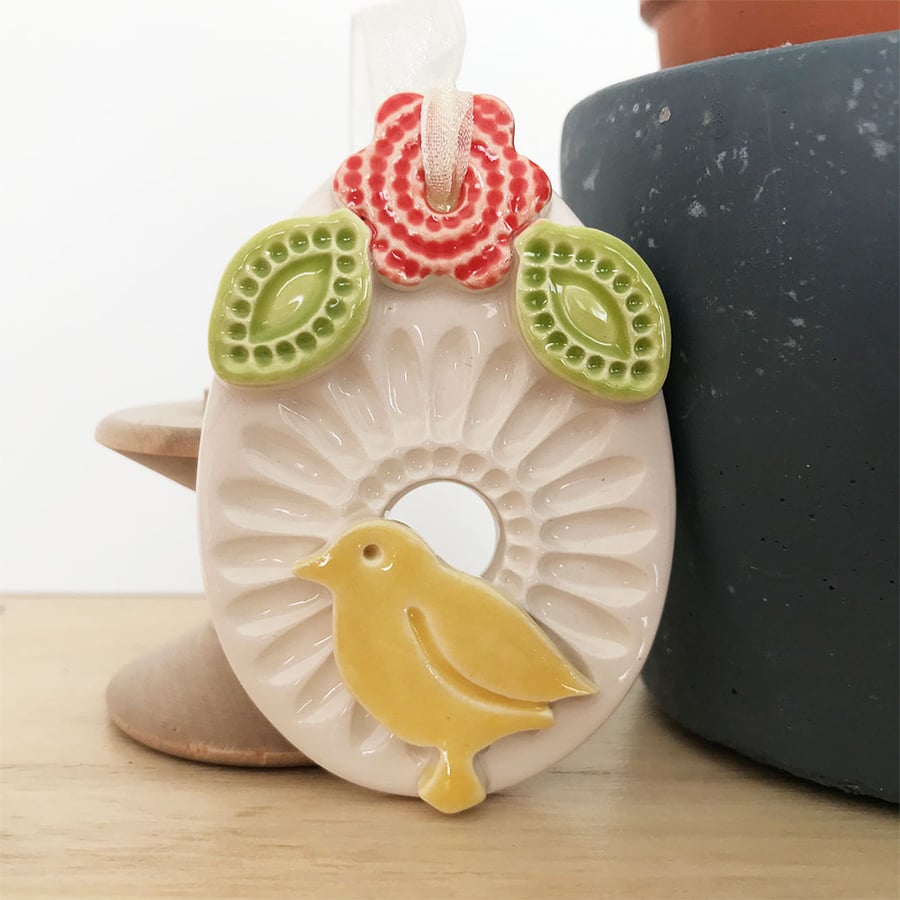 Pottery Easter Egg decoration with orange flower and yellow chick