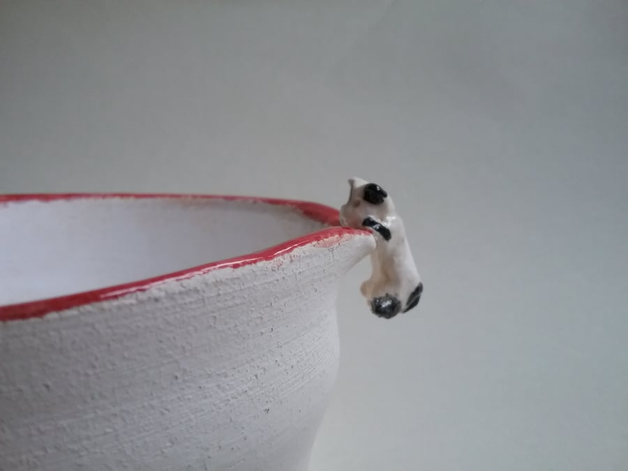Hand made small ceramic dog bowl with tiny hand sculpted dog and bone
