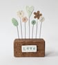 Clay Heart and Flowers in a Button Garden Block 'Love'