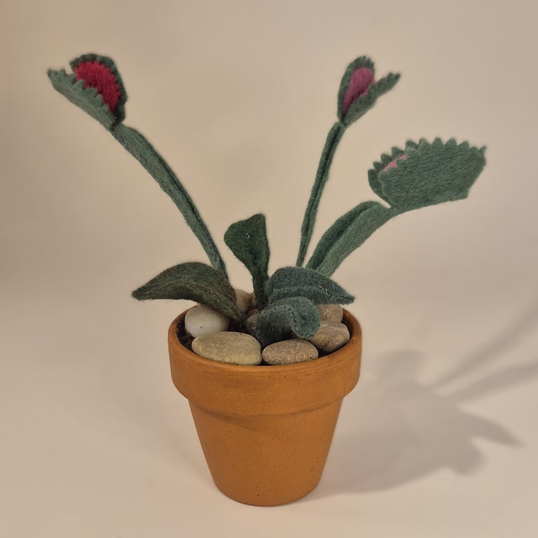 Felt Venus fly trap in a terracotta pot