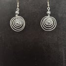 Handmade spiral silver tone drop earring