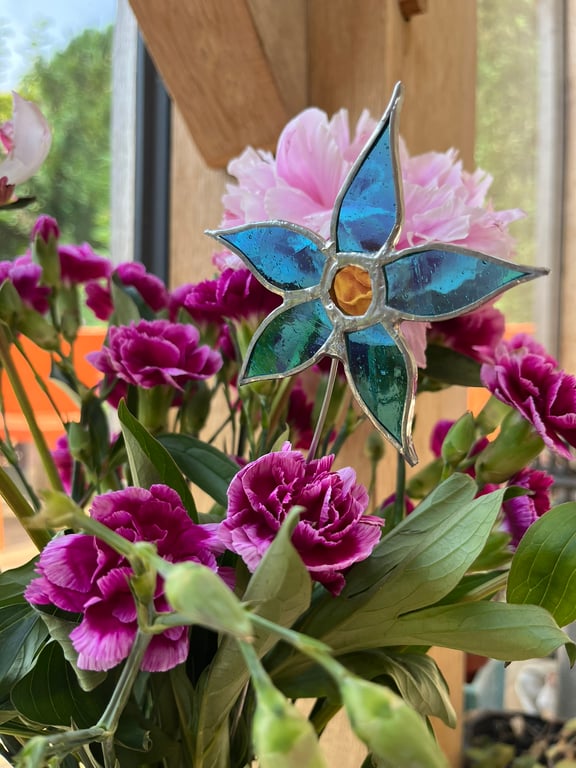 Turquoise blue stained glass flower stem