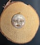 Hand sculpted moon face pendant