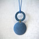 Blue porcelain pendant with green speckled design