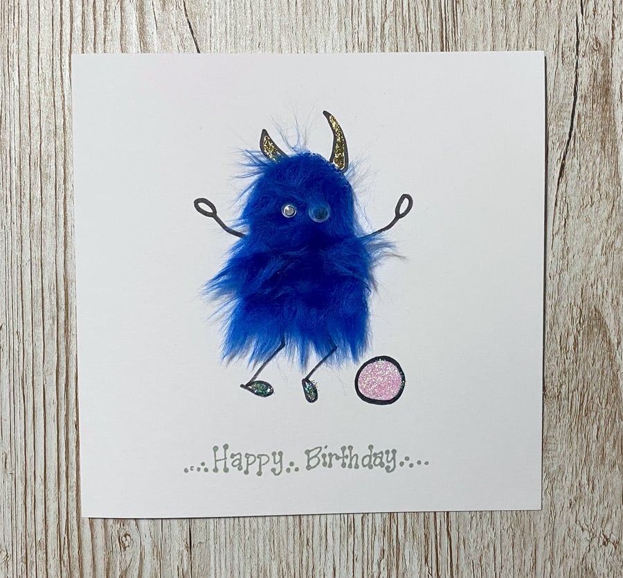 Birthday card - blue friendly mini monster playing football