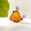 Rich orange stained glass bird with funky hair style, Bird with  Attitude