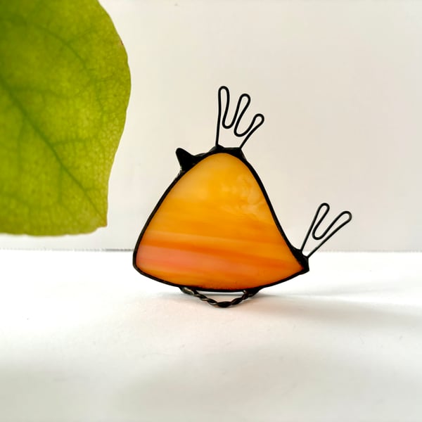 Rich orange stained glass bird with funky hair style, Bird with  Attitude