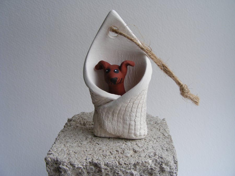 Brown dog in a blanket (1)