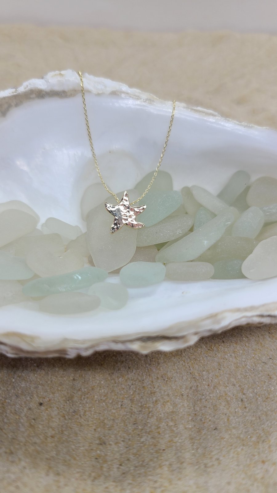 Gold starfish pendant 