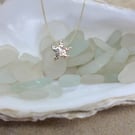 Gold starfish pendant 