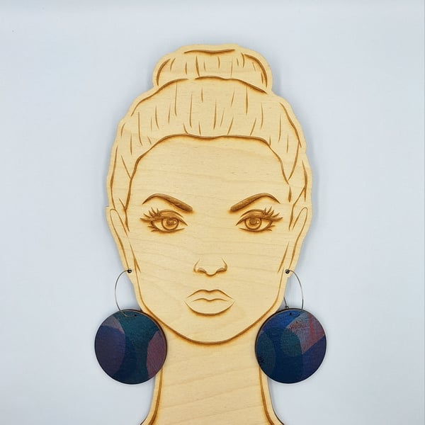 Big hooped dangly earrings with a hand printed abstract design
