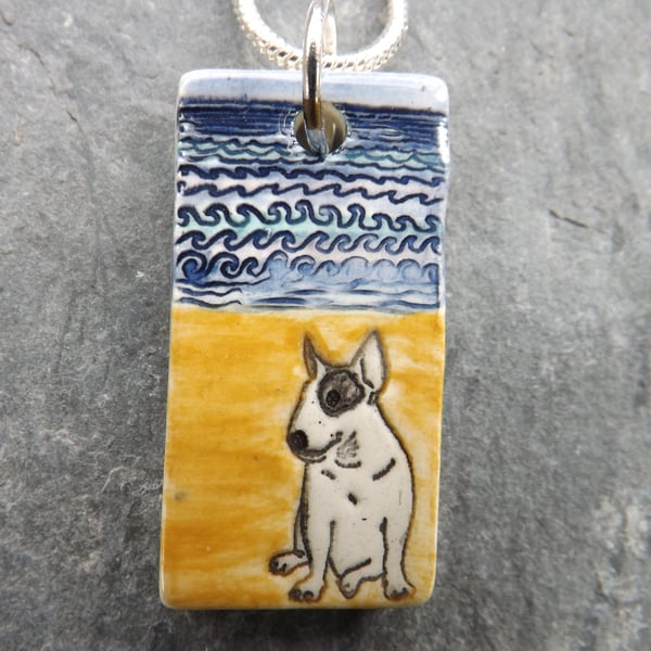 Handmade Ceramic Bull Terrier dog on the beach pendant