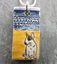 Handmade Ceramic Bull Terrier dog on the beach pendant - Image 1