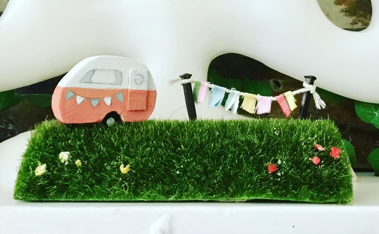 Handmade wooden caravan, camping, washing on line