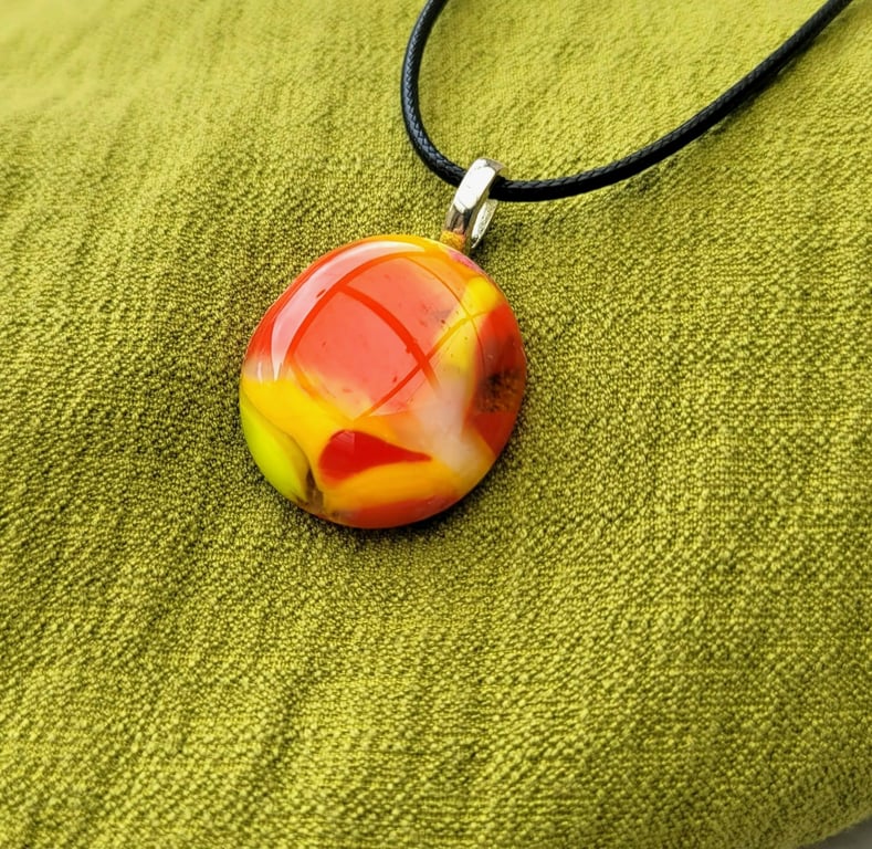 Yellow and orange glass necklace.
