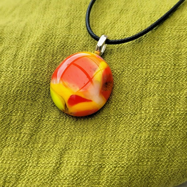 Yellow and orange glass necklace.