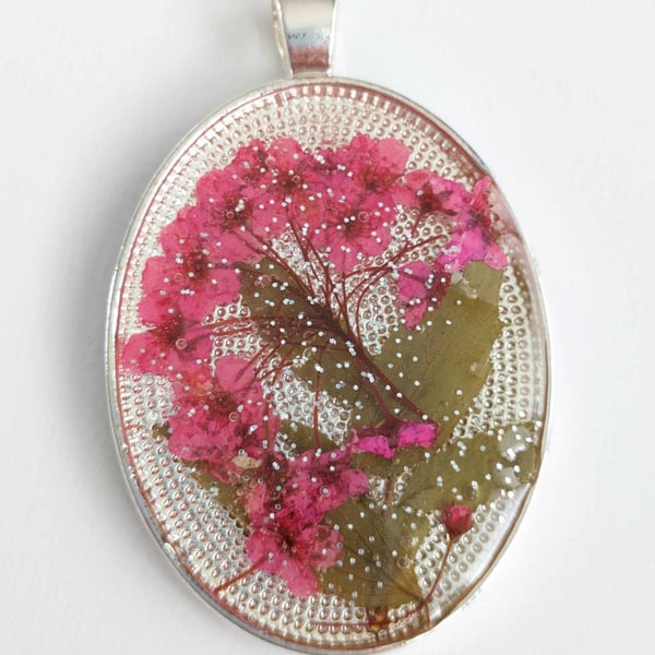 Large Resin Oval Pendant With Tiny Pink Flowers