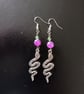Silver snake charm dangle earrings with green and purple beads