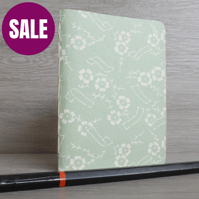 Small hand bound A7 notebook or sketchbook with green Japanese patterned cover