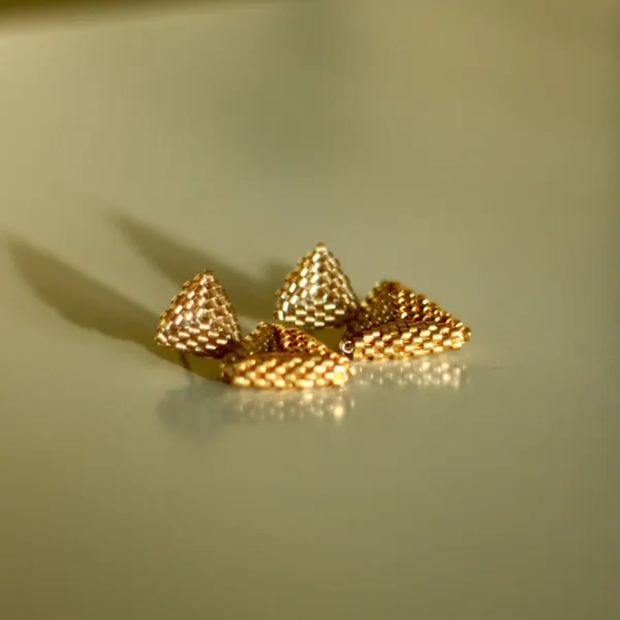 Champagne gold and 24kt gold plated earrings with free UK delivery.