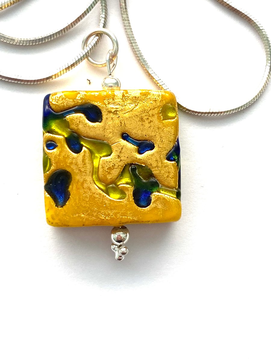  Murano glass gold square pendant with sterling silver snake chain.