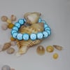 BR298 Pale blue miracle bead bracelet