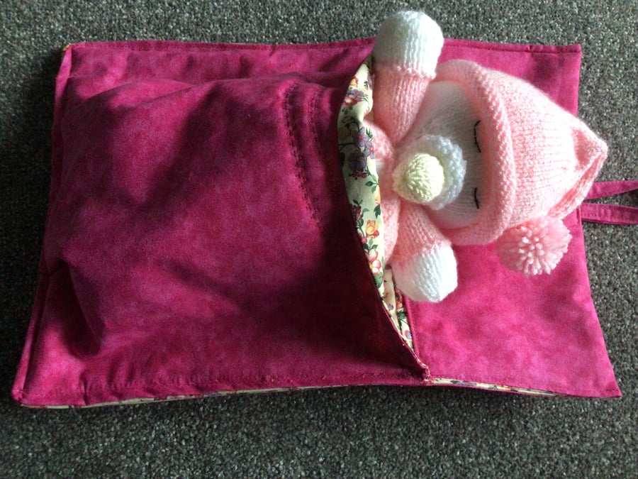 Cuddly baby in her warm bed