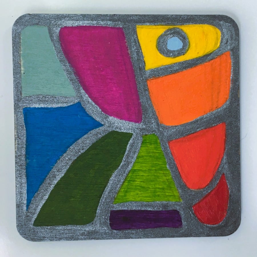 Stained glass effect. Hand painted wooden fridge magnets.
