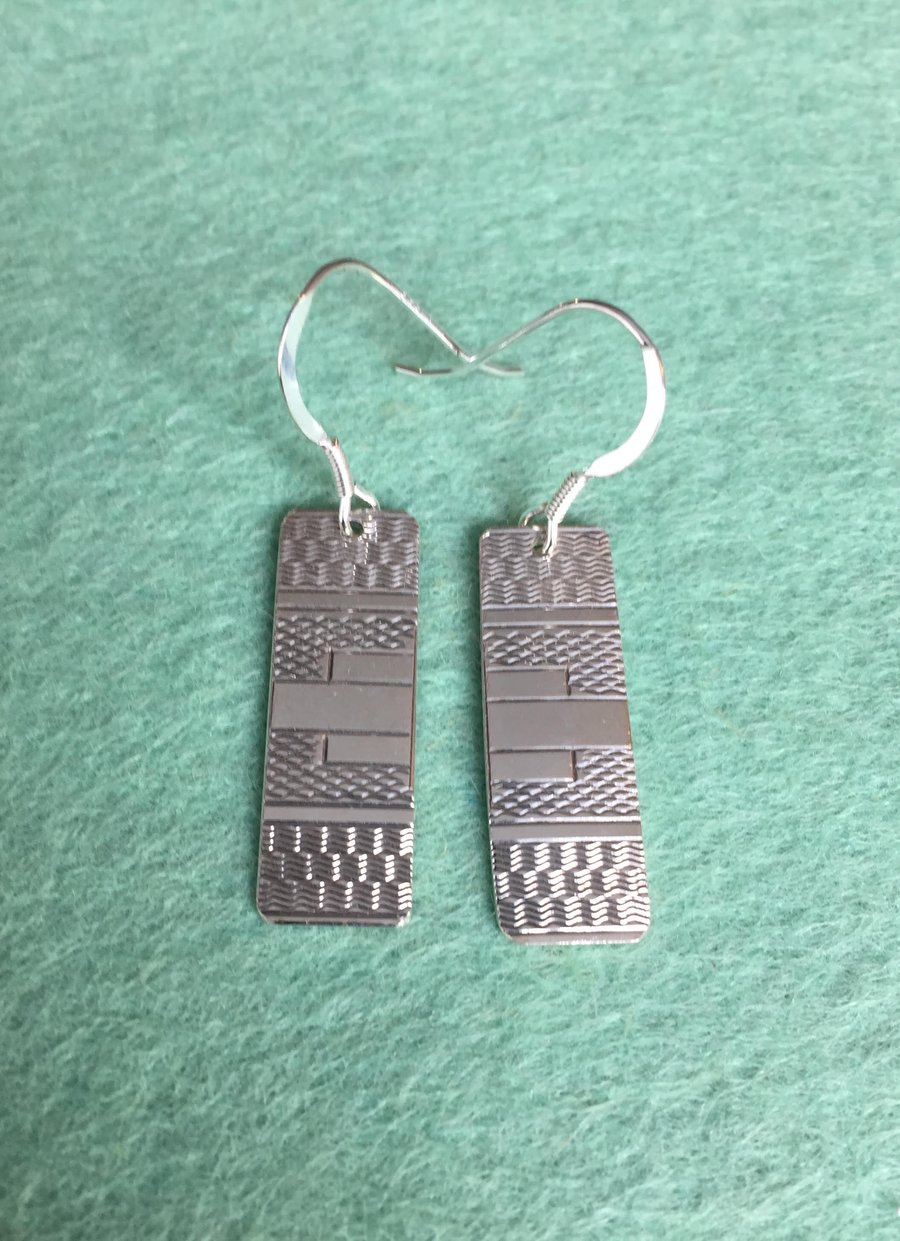Silver earrings made from a 1935 Chester napkin ring 