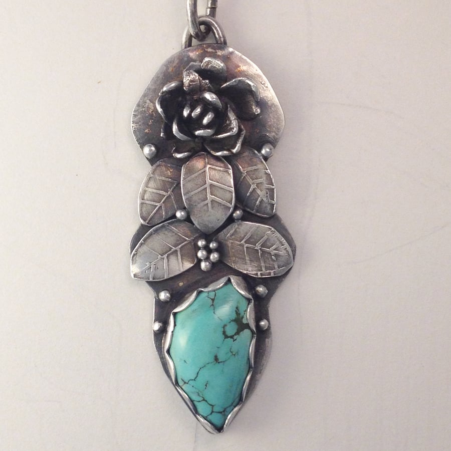 Silver flower and Turquoise pendant