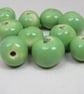 10 Small Apple Green Glazed Clay Beads - Image 2