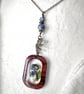 Forget Me Not Wood and Resin Pendant with an  Antique Brass Plated Chain.
