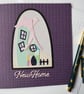 New Home Card - whimsical house with on a purple knitted effect embossed card