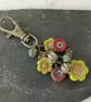 Red, green and antique gold bag charm with Czech glass beads and flowers - Image 4