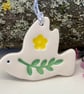 Teeny ceramic dove decoration with leaves and yellow flower