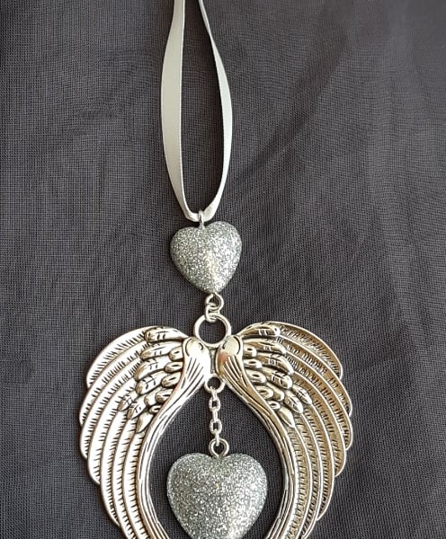 Gorgeous Angel Wings Ornament with Glittery Silver Hearts.